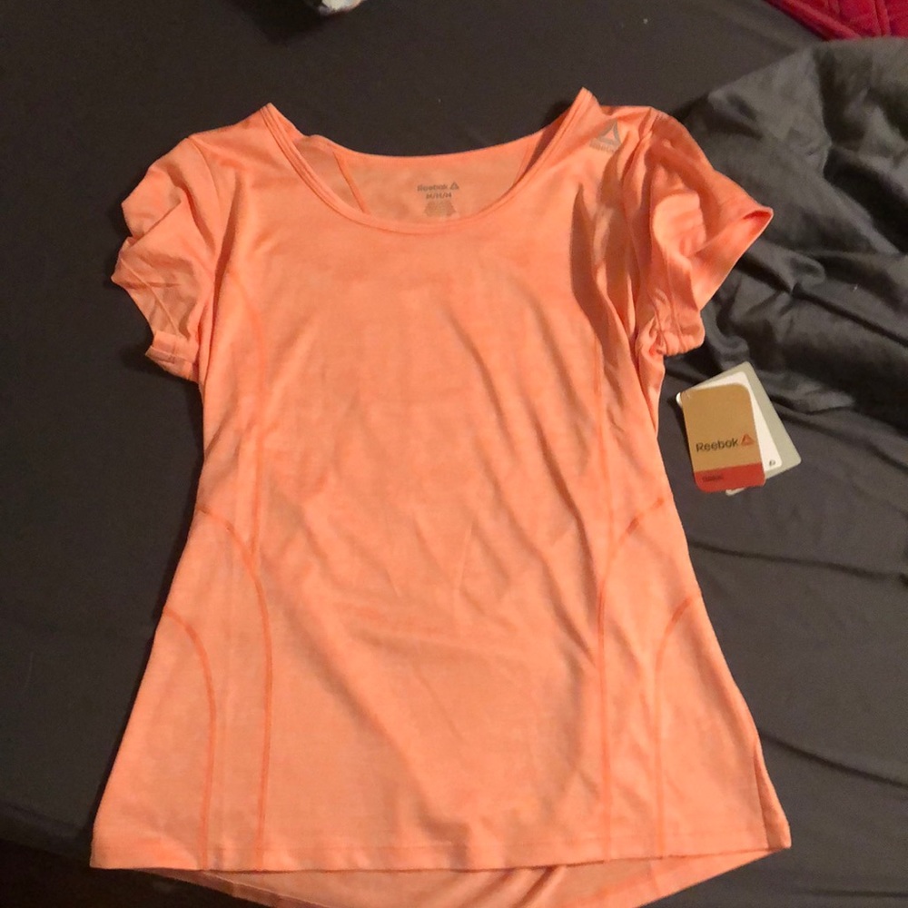Light pink reebok T-shirt